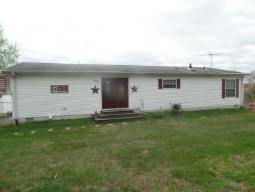 NUMEROUS ADDED FEATURES IN THIS HOME
