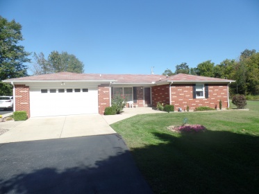 LOVELY BRICK HOME ON JUST OVER 1 ACRE