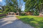 COMMUNE WITH NATURE IN THIS TRI-LEVEL HOME.